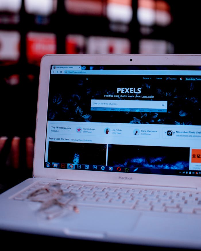 services-03 Laptop on a desk showing the Pexels homepage, highlighting its web interface.